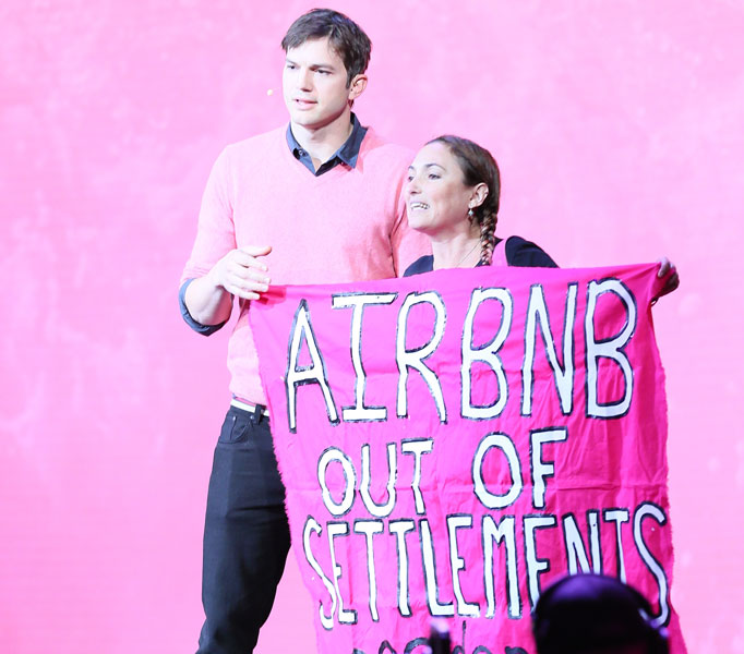 Ashton Kutcher and protester