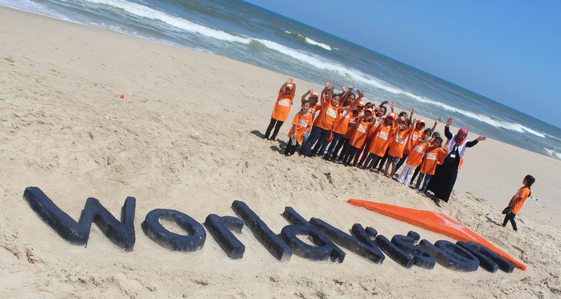 Children on Gaza Beach in World Vision t-shirts