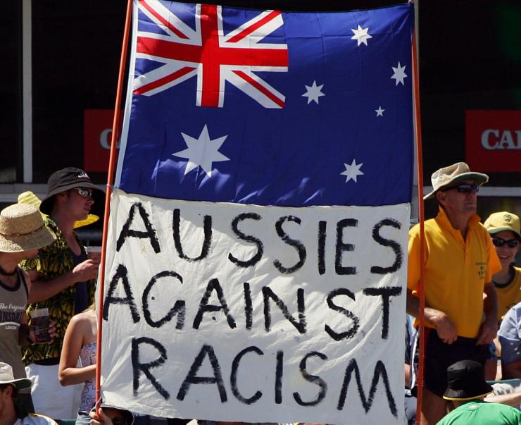 anti racism banner at the cricket