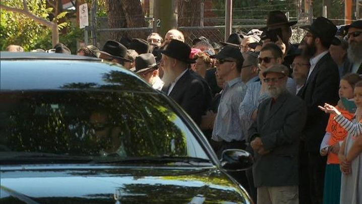 mourners at Thalia Hakin's funeral