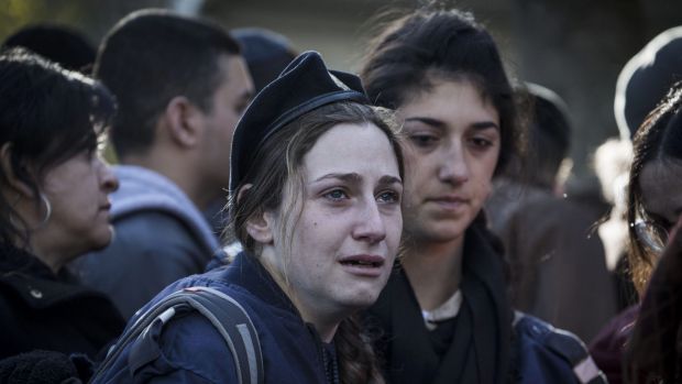 mourners at funeral for Israeli soldier