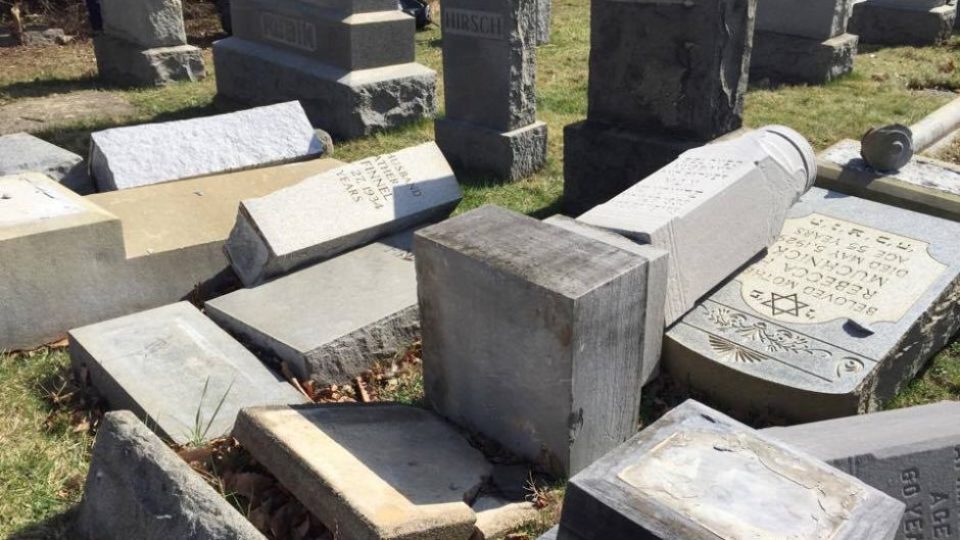 damaged tombstones