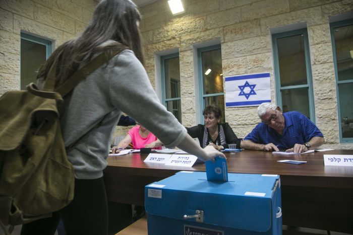 Israeli casting a vote in an election