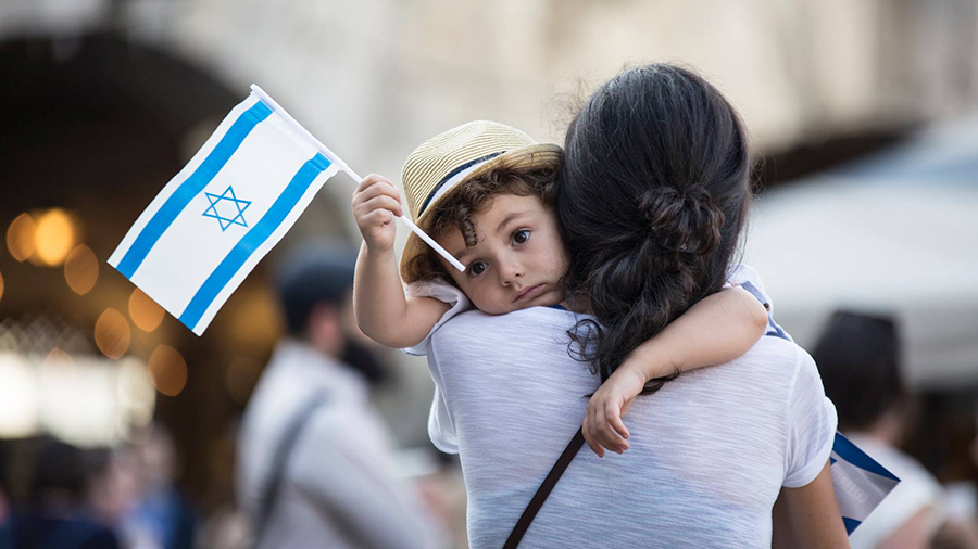 small child with an Israeli flag