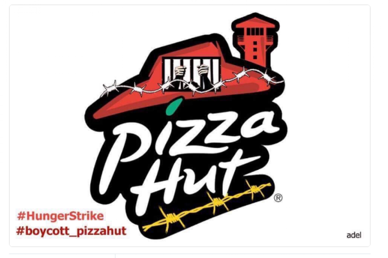 pizza hut logo with barbed wire and prisoner in cell