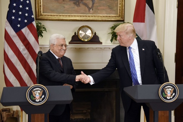 Trump and Abbas shaking hands at press conference