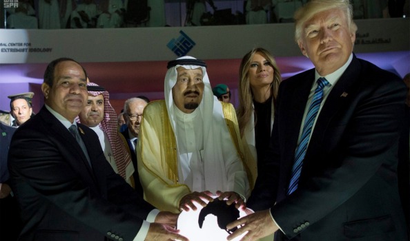 Trump and the saudis with their hand on the orb
