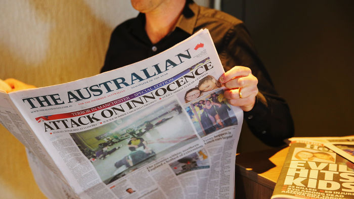 front cover of The Australian newspaper covering a terrorist attack