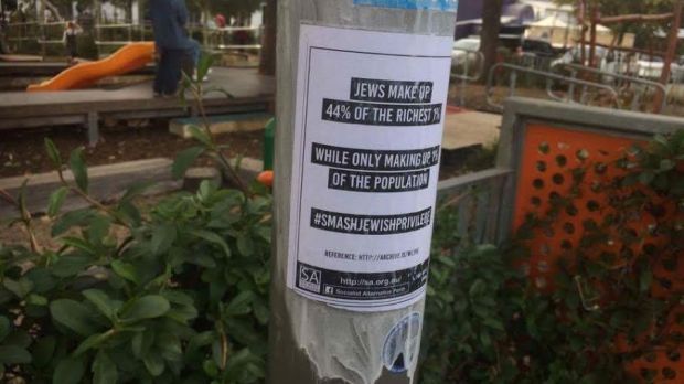 the poster wrapped around a street pole