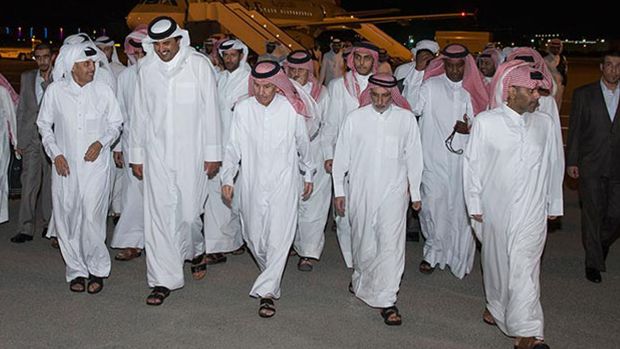 lots of Qataris walking