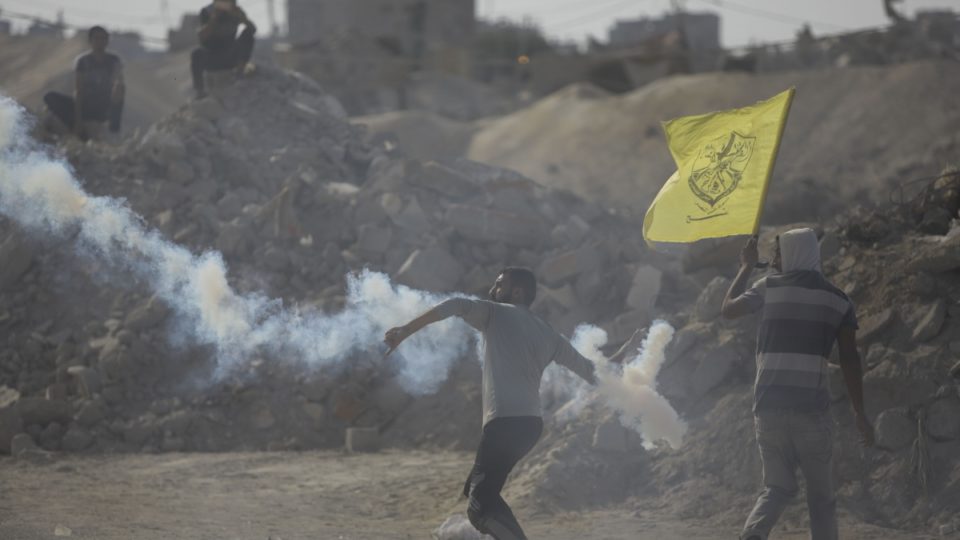 Palestinian throwing molotov cocktail towards israeli forces