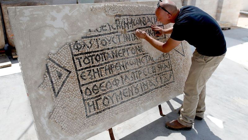 archaeologist working on the mosaic