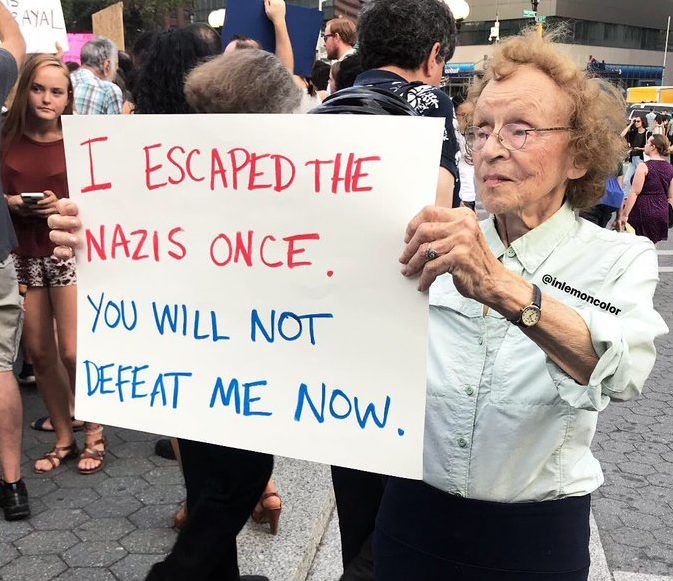 lady holding her sign
