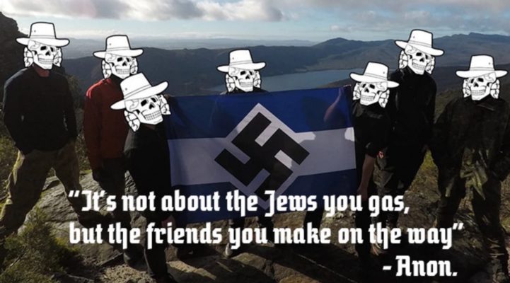 7 people holding swastika flag with their faces photoshopped with skulls