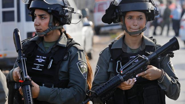 two israeli border policewomen on patrol
