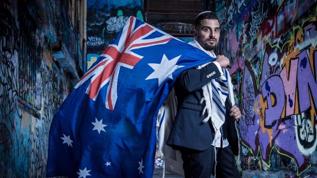 avi draped in a tallit and australian flag
