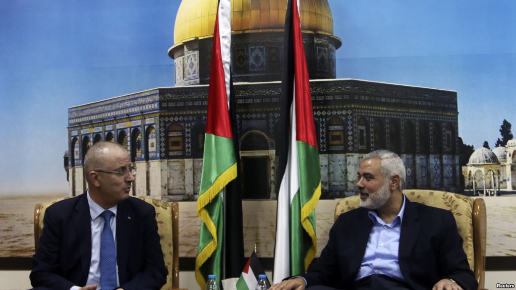 Palestinian-prime-minister-Rami-Hamdallah-and-senior-Hamas-official-Ismail-Haniyeh