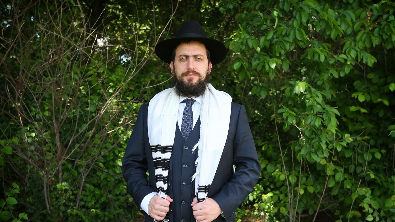 Rabbi standing posing in tallit (prawer shawl)