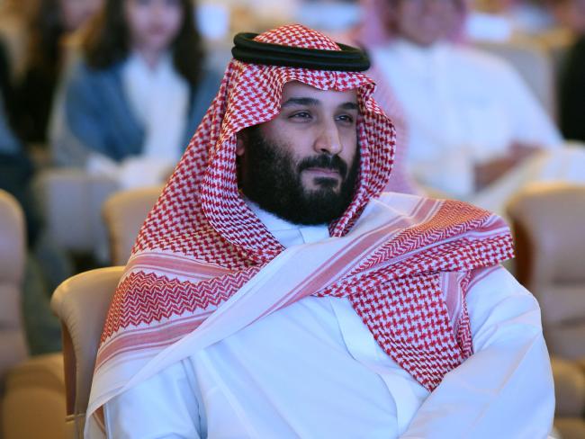 Saudi Crown Prince seated looking into the distance