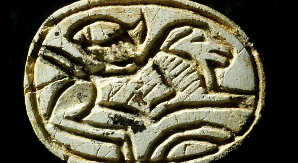 ancient coin with lion on it