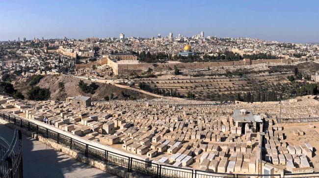 View of Jerusalem from the Mount of Olives with old city then new behind it