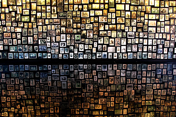 memorial to victims of the holocaust with a wall of photos