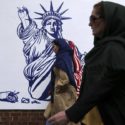 Iran unveils anti-US murals on old embassy
