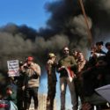 Iraqi militiamen hurl stones at US embassy