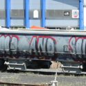 Nazi symbols and a slogan have been painted on train carriage in Brisbane