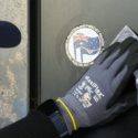 Stickers of neo-Nazi group National Socialist Network placed in Rundle Mall on first day of NAIDOC Week